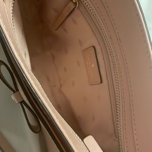 Supe cute blush Kate Spade crossbody. Spacious handbag.
